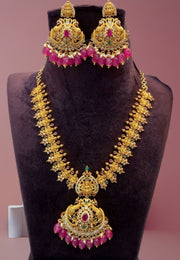 Traditional short necklace with ruby colour beads and guttapusalu hangings